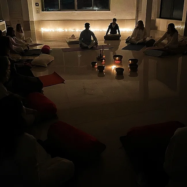 Adult participants during meditation and inner practice at Samvedna